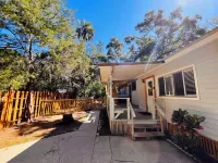 Waterfront Retreat with fenced yard, porch + bar, canal views, NEW DOCK