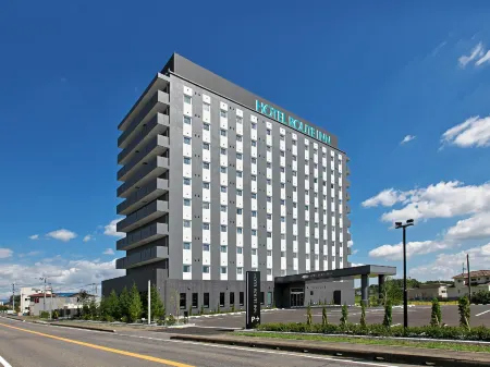 Hotel Route Inn Shimotsuma Отели в г. Тикусей