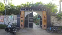 Urban Escape Farmhouse by GGH Noida