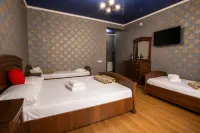 Tri Palmy Hotel - بيوت ضيافة