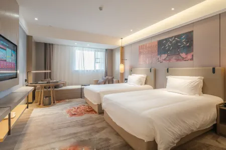 Mans Junlan International Hotel Отели рядом с достопримечательностью «Jiangxi Vocational College of Environmental Engineering (Dongjiangyuan Campus)»