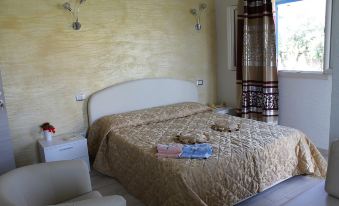 Room in Guest Room - S'Olivariu Village Affittacamere - Deluxe King Room