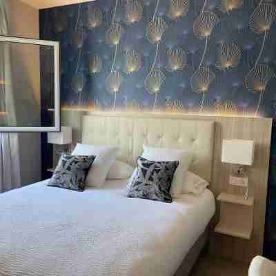 Logis Hôtel l'Amandier Rooms