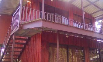 Hotel Cabinas y Tour Aaron Tortuguero - Housity
