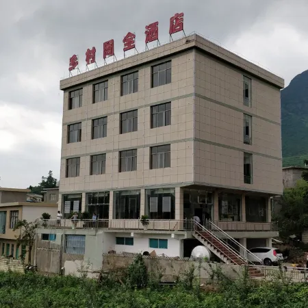 Wumeng Dacaoyuan Xiangcun Zhouquan Hotel