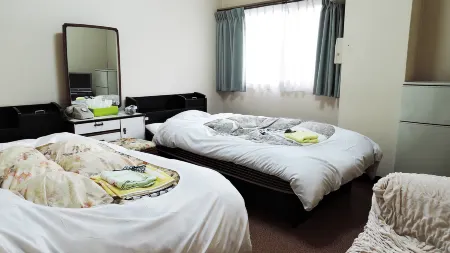 Business Hotel Kirakuso Отели в г. Таварамото