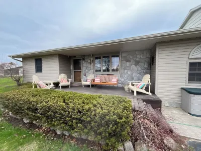"Pet-Friendly Getaway: 5-Bedroom Haven Near Beach & Downtown with Hot Tub"