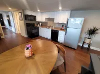 Cozy “Home Away From Home” 1 Bedroom basement Suite w Full Bathroom & laundry