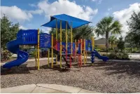 Modern clean home with private pool covered patio, game room and close to Disney