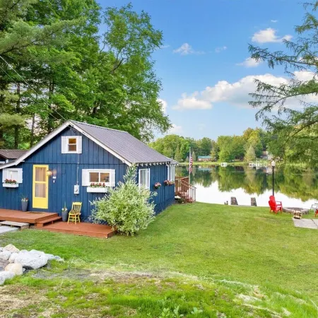 The quintessential lakeside cabin. Tradition meets today. Family, friends, pets!