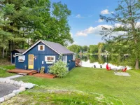 The quintessential lakeside cabin. Tradition meets today. Family, friends, pets!