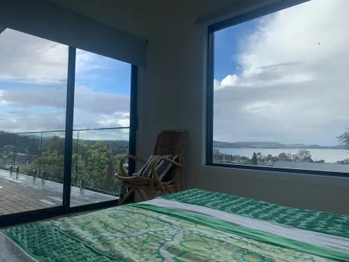 Stunning water views; relaxed coastal atmosphere; multiple entertaining areas