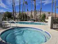 Sunny Palm Springs Resort style condominium living withTennis and swimming