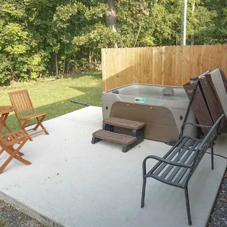 Spacious Home in Moors Community on KY Lake with Outdoor Hot Tub and Fire Pit
