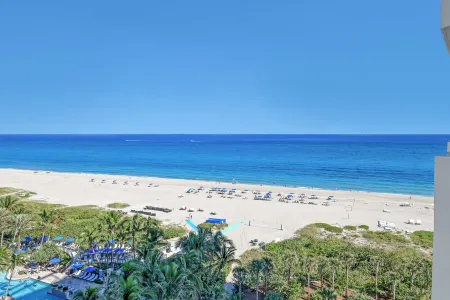 Brand New Beachfront 2 bed/2.5ba Condo in 5 star resort Palm Beach area