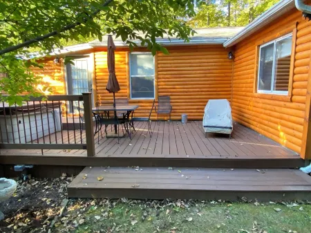 2 Br, 1-1/2 Bath House in Wooded Setting with Private Back Yard, Deck, Hot Tub.