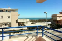 Apartment with pool and sea views.