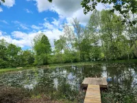 New! Custom built private home on a pond, with large hottub.