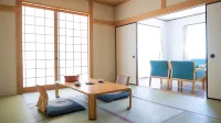 Hidden Village Hotel - Mori No Koryukan Hotel di Kurotaki