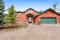 Spacious lakefront home with deck, private dock, four fireplaces, & W/D