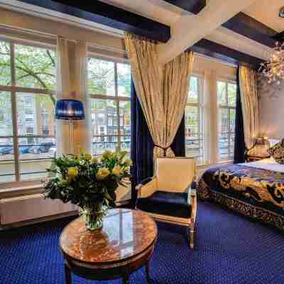 Ambassade Hotel Rooms
