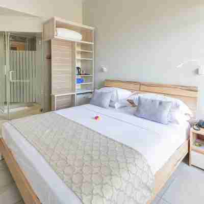 Le Peninsula Bay Beach Resort Rooms