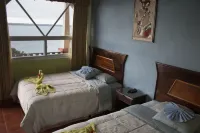 Hotel la Ribiera del Lago Peten Itza Отели в г. 