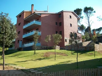 Aparthotel del Golf Hotels near Torrent de Can Belasc