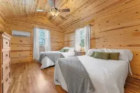 Pet-Friendly Peaceful Cabin Near River w/ Fire Pit + Hot Tub Sleeps 14