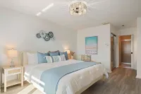 Sunshine 2-bedroom Shorewalk condo near beaches, IMG - Pickleball, Pool Lakeview