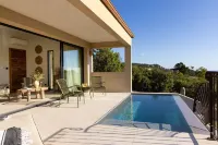 Hôtel A Cala - Suites Piscines privées et Vue Mer Hotels in Conca
