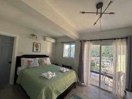 Tropical Apartment- Charming 1-Bedroom Apartment Overlooking Soufriere Town.