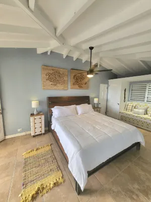 MILLION DOLLAR VIEW SET ATOP ONE ACRE OF CARIBBEAN SLENDOR