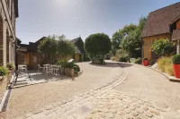 Le Jardin Découverte Отели в г. Эр
