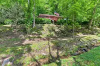 Smoky Mtn Cottage on Creek w/ Lanai & Forest Views - 3-Star