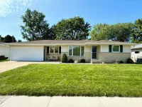 Steps to Titletown District- Spacious 4-bedroom  with large patio, heated garage