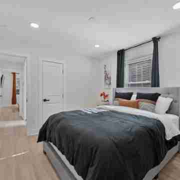 Unwind in our bold + stylish 4BR, 2BA DC gem! Rooms