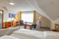 Sport- Und Tagungshotel de Poort Hotels in Uedem