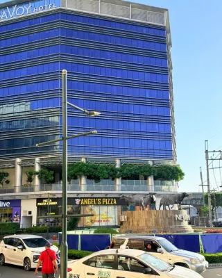 Henry & Adiche  Emperador Building