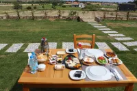 Tinos Hotel & Bag Evi -  Ferienhäuser