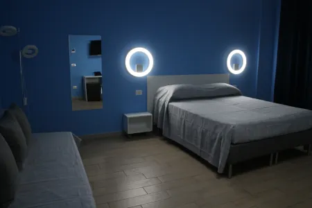 Orchidea - Quadruple Room - B&B Lasso Отели рядом с достопримечательностью «Castello Ducale»