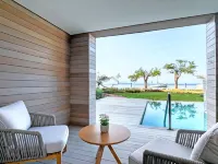 Vathi Cove Luxury Resort & Spa Hotels near شاطئ ماربل