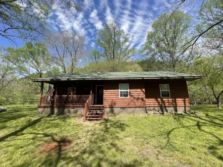 Peaceful cabin steps away from the creek, convenient access to ATV trails!