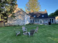 Historic stone farmhouse with rail trail and river access