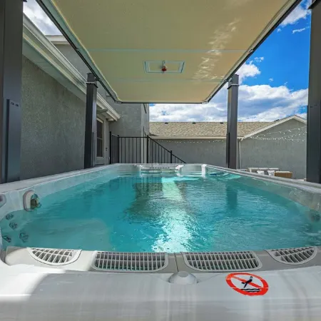 20 ft swim spa! 5 bed, 4 bath, hot tub, 5 acres, game room, north CO Springs!