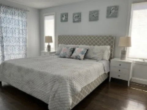 Renovated Home with heated pool near the beach! Fenced in yard +pet friendly