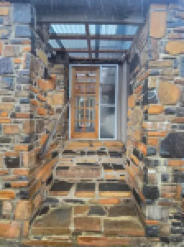 Cosy water view cabin in amongst the pristene wilderness of Central Highlands Hotels in Cradle Mountain