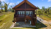 Beautiful log cabin w/ private dock, gameroom, 23mi to beach, 3bd2ba, sleeps 11