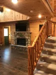 Log home nestled in tall pines near Norway Lake