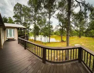 Riverfront house with a party barn & private boat ramp